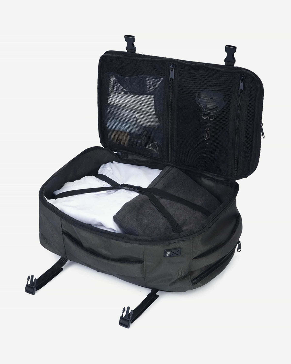 Dark gray carry-on travel backpack organized interior view