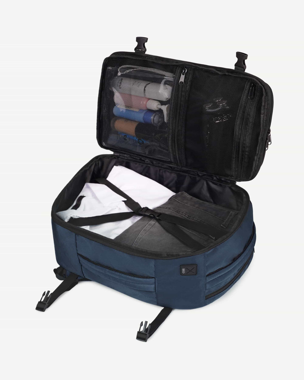 Dark blue carry-on travel backpack organized interior view