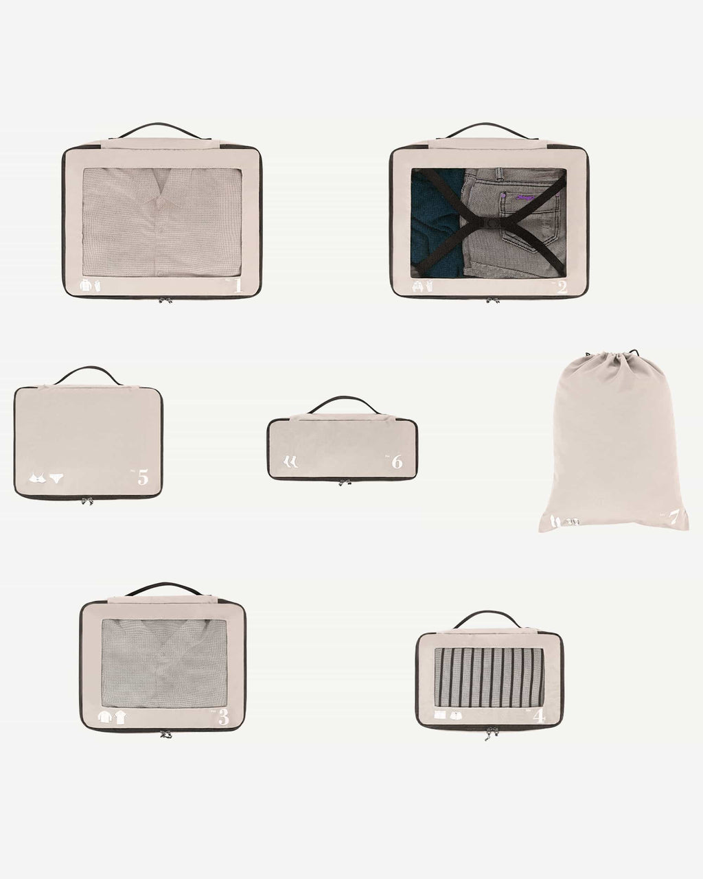 Beige packing cubes stacked for organized luggage