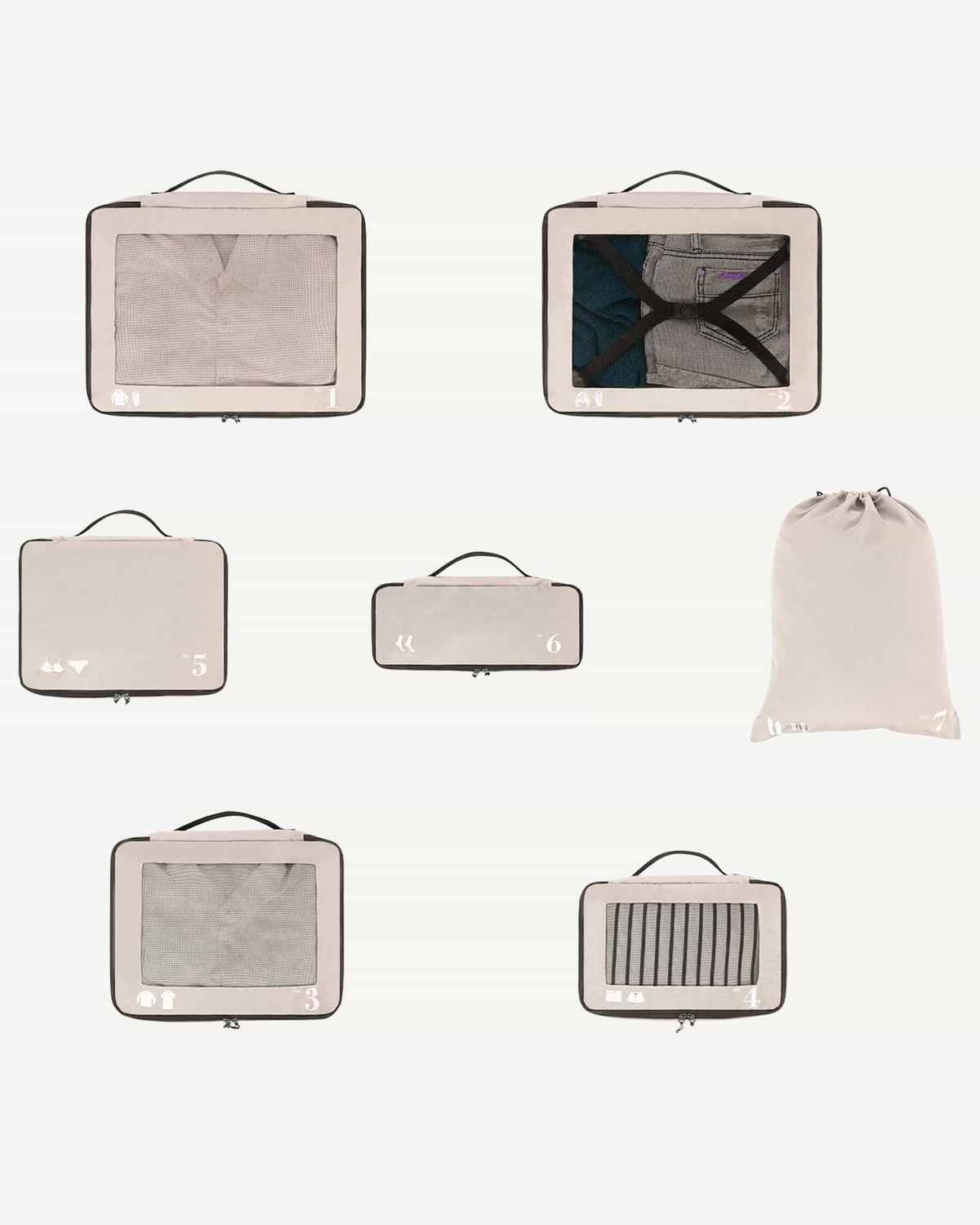 Beige packing cubes stacked for organized luggage