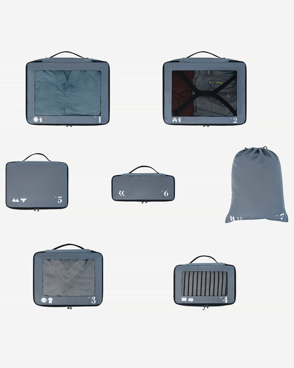 Grey packing cubes stacked for organized luggage