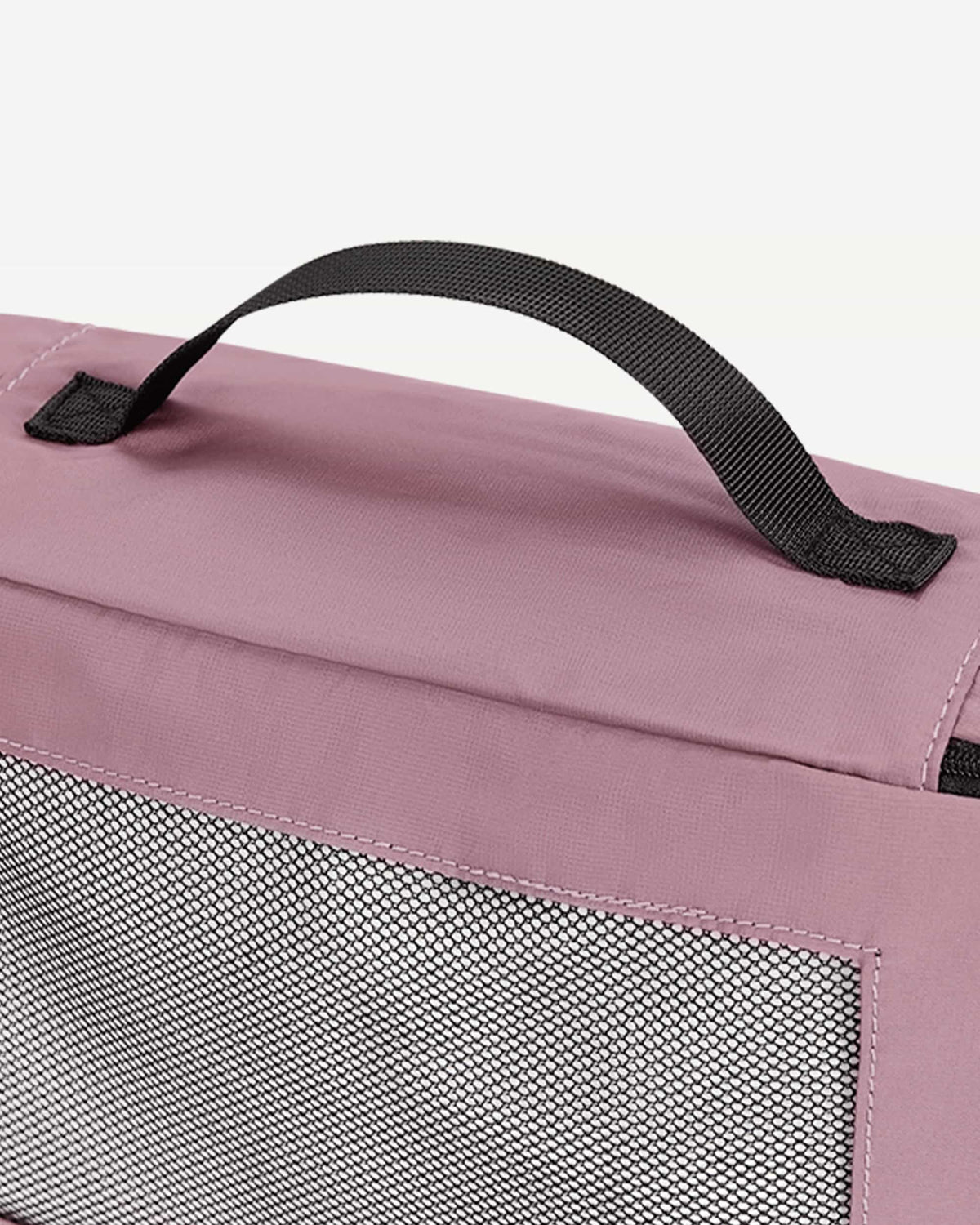 Pink packing cubes arranged as suitcase organizers