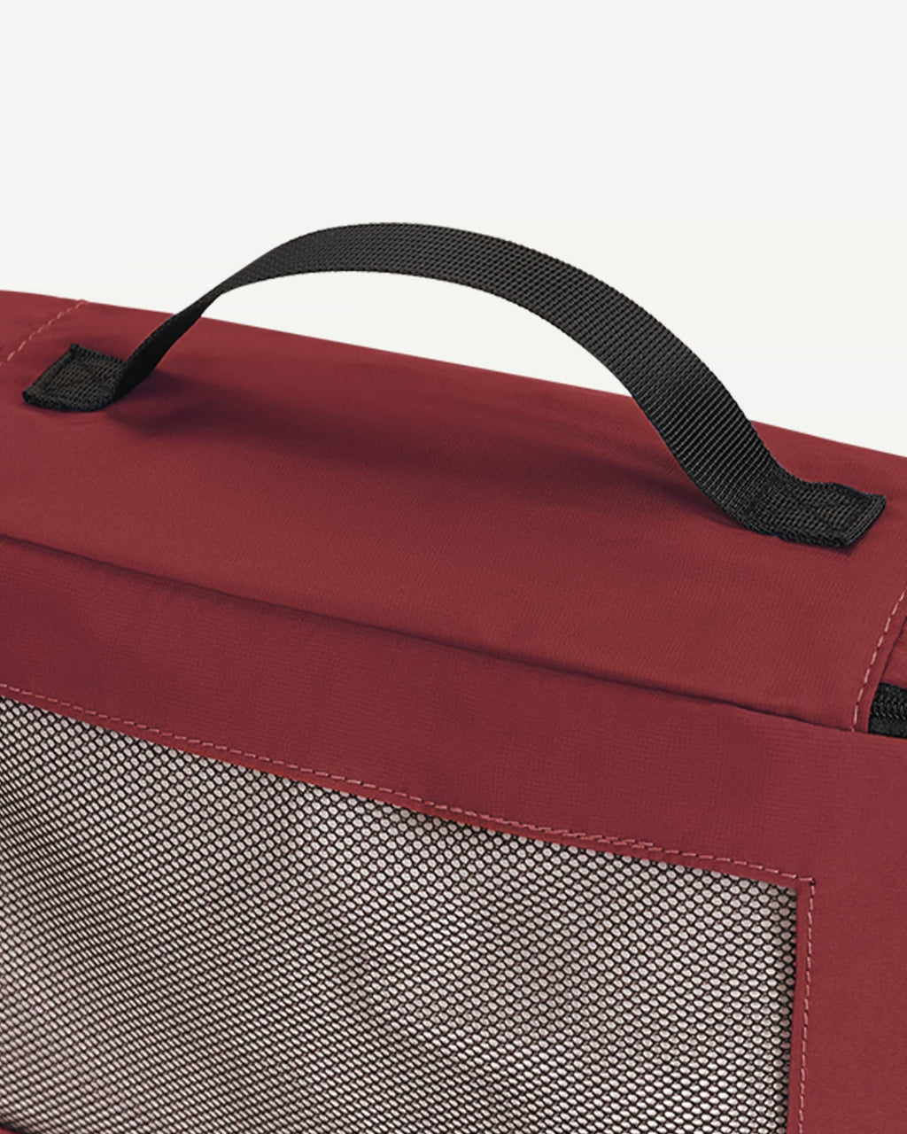 Red packing cubes arranged as suitcase organizers