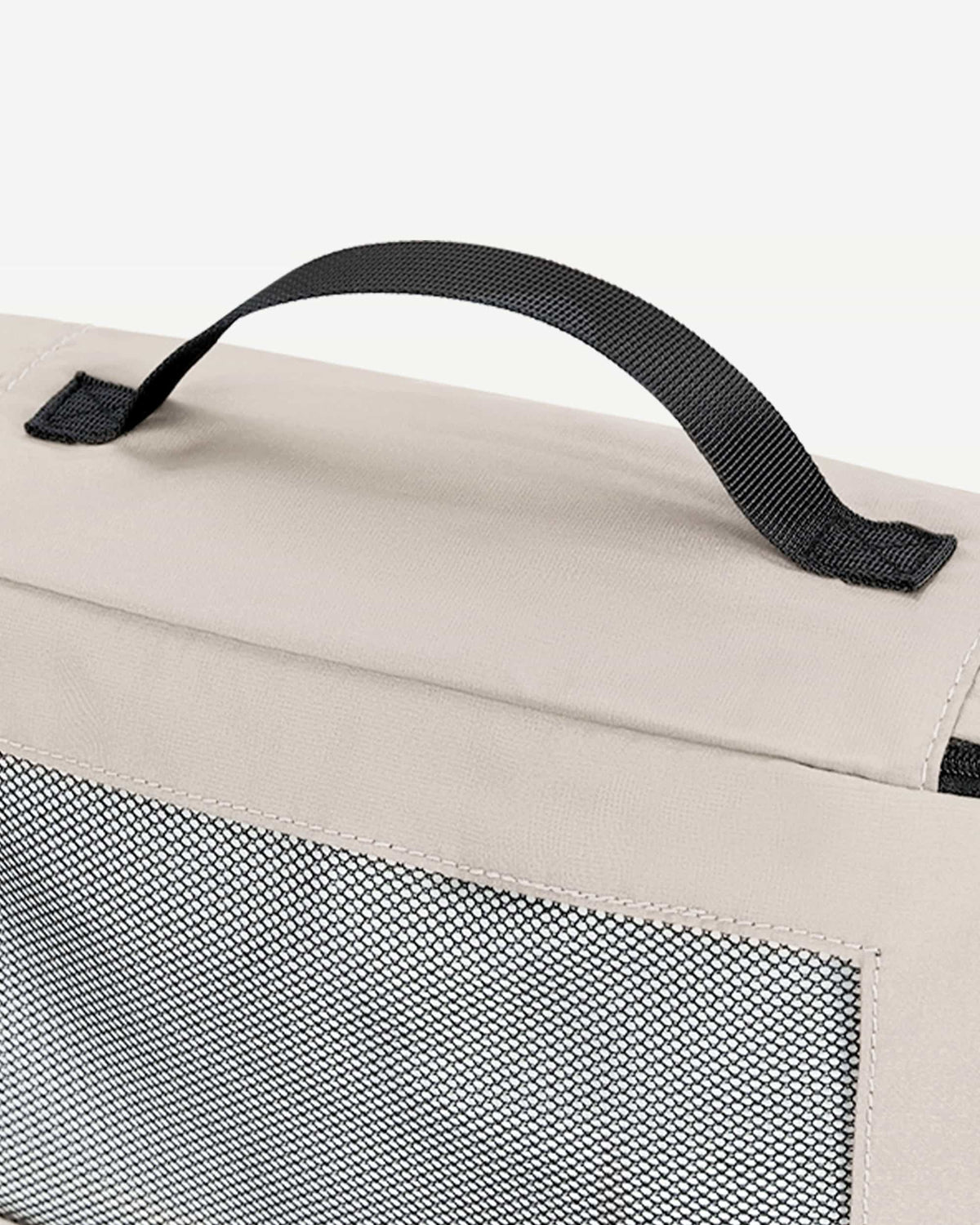 Beige packing cubes arranged as suitcase organizers
