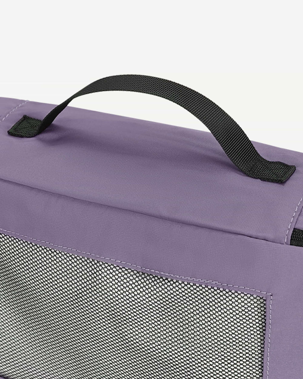 Purple packing cubes arranged as suitcase organizers
