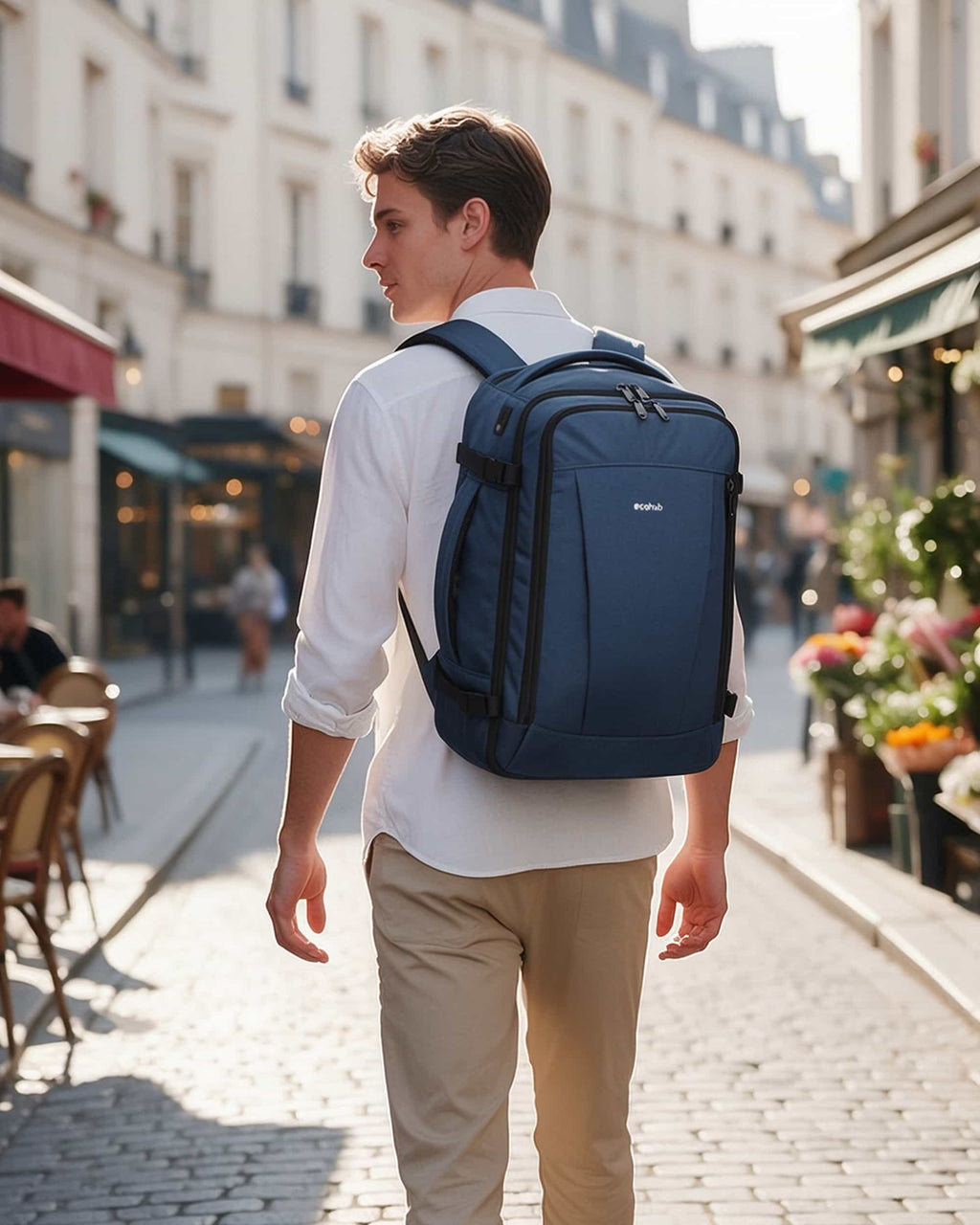 Dark blue carry-on travel backpack angled view